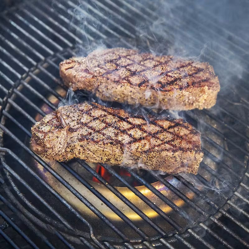 grilling meet on a charcoal grill