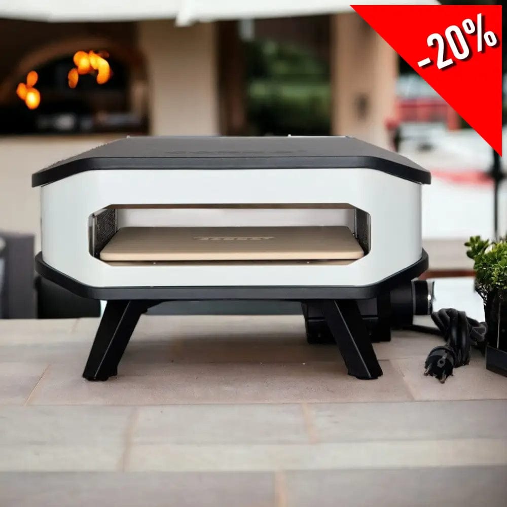 Cozze Electric Pizza Oven outdoors with pizza stone inside