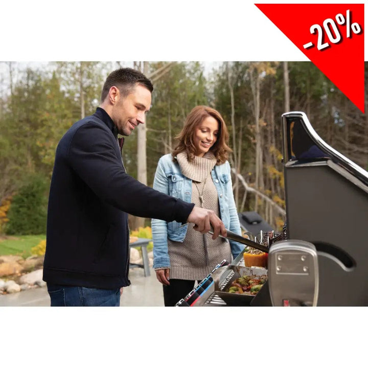 man and woman grilling on Napoleon Prestige PRO 665 RSIB