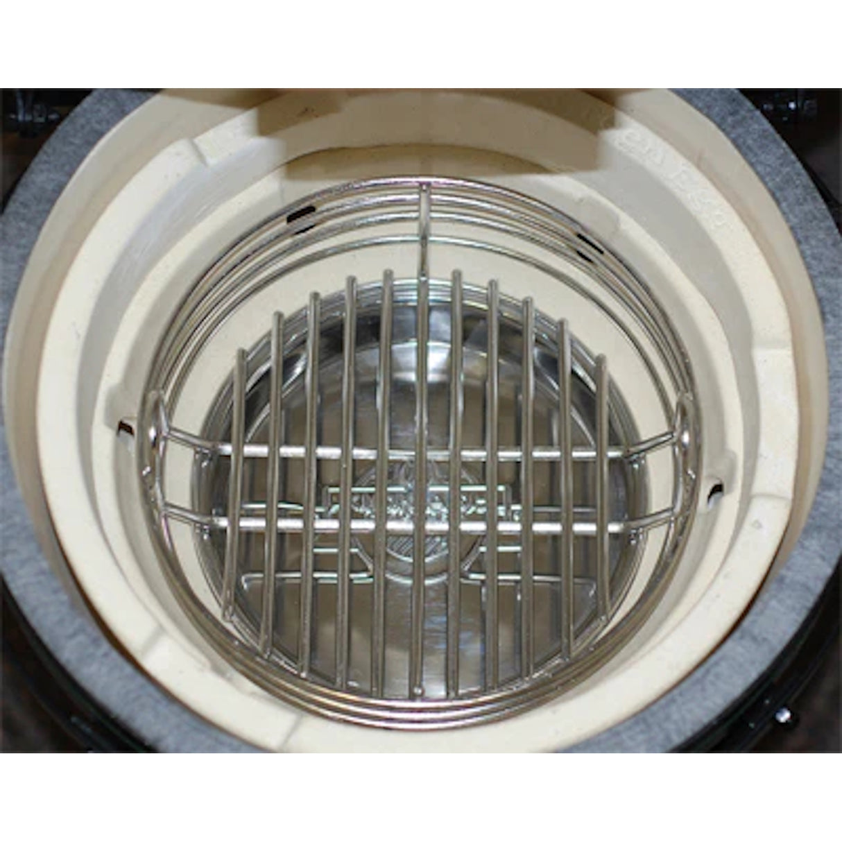 MiniMax Kick Ash Basket in the grill