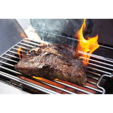 steak with flames prepared on infrared side burner Napoleon Prestige PRO 665 RSIB