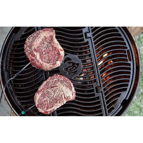 grilling steak with Napoleon PRO Charcoal Black Kettle Grill