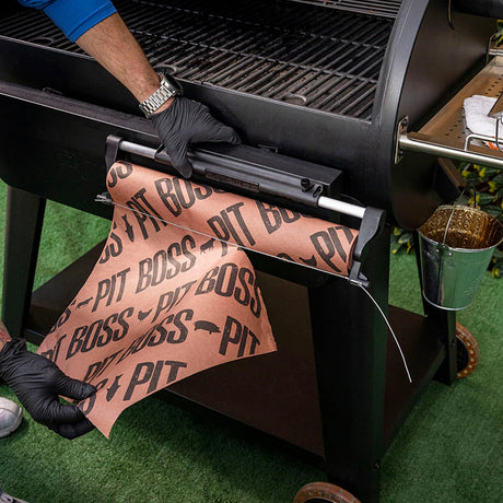 Magnetic Butcher Paper Holder man ripping paper