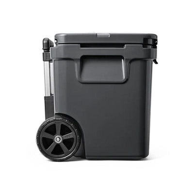 left side of a closed lid and retracted handle Charcoal YETI Roadie - 60 Wheeled Cool Box
