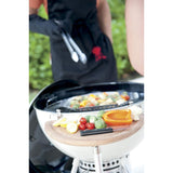 people grilling vegetables on Weber Premium Large Grilling Basket on a grill