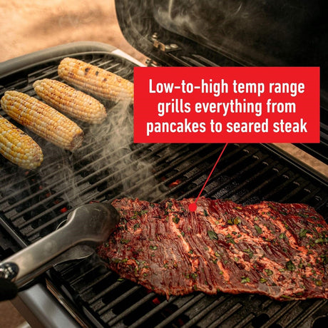 grilling steak and corn on Weber Traveler Gas Barbecue