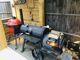 BBQ Offset Smoker Burning Wood in the Man Cave