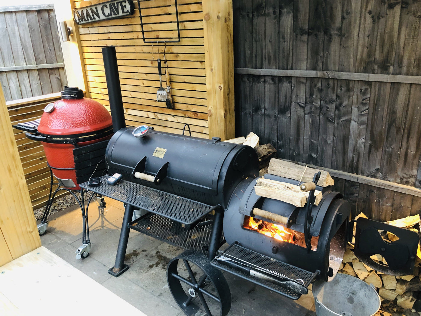 BBQ Offset Smoker Burning Wood in the Man Cave