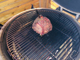 Meat Cooked on Top of BBQ Lava Stone Plate