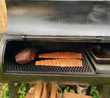 Ribs and meat slabs ready for roasting on a Franklin Pit's cook chamber