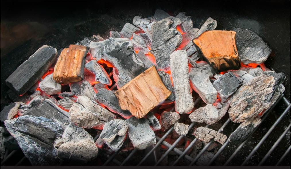 Wood Chunks Burning on Charcoal Grill